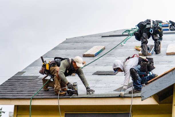 Professional Roofing technician working in Passaic, NJ
